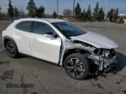 ✅ 2022 Lexus UX 250h • VIN: JTHX9JBH2N2056285 • Lot: 87221214. Listed on Copart with 33,377 mi. Free auction sales archive from the USA and detailed vehicle history report at DreamBid. Image 4.