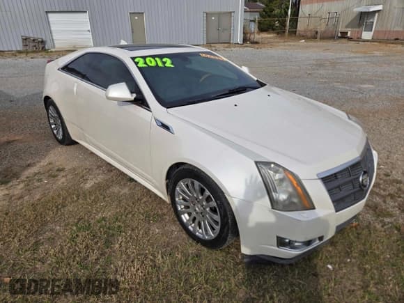 ✅ 2012 Cadillac CTS Performance • VIN: 1G6DJ1E36C0101624 • Лот: 93383035. Опубликован ранее на Copart с пробегом 209 852 миль. Бесплатный доступ к архиву аукционных продаж из США и подробный отчёт об истории автомобиля на DreamBid. Изображение 1.