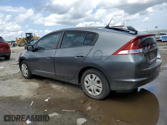 ✅ 2012 Honda Insight LX • VIN: JHMZE2H52CS004272 • Lot: 70080915. Listed on Copart with 153,923 mi. Free auction sales archive from the USA and detailed vehicle history report at DreamBid. Image 2.