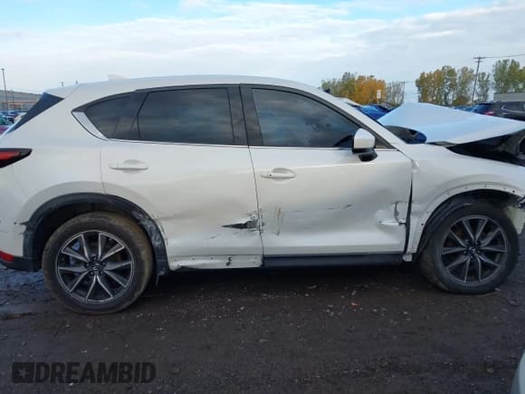 ✅ 2018 Mazda CX-5 Grand Touring • VIN: JM3KFBDM2J0441881 • Lot: 43526832. Listed on IAAI with 104,567 mi. Free auction sales archive from the USA and detailed vehicle history report at DreamBid. Image 13.