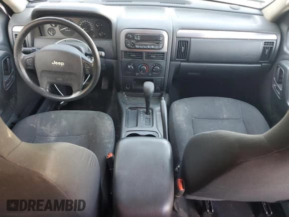 ✅ 2003 Jeep Grand Cherokee Laredo • VIN: 1J4GX48S73C522371 • Lot: 91577645. Listed on Copart with 276,316 mi. Free auction sales archive from the USA and detailed vehicle history report at DreamBid. Image 8.