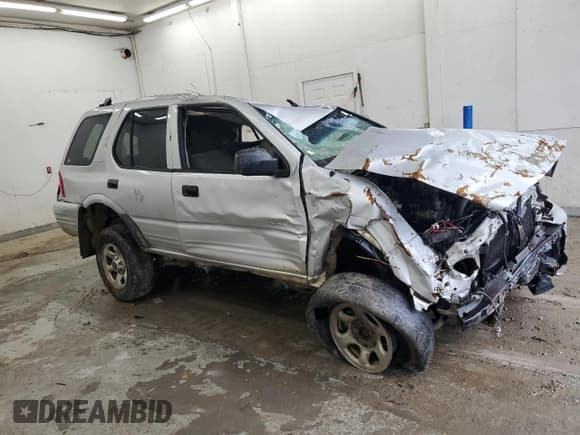 ✅ 2002 Isuzu Rodeo • VIN: 4S2DM58W924331185 • Лот: 62650715. Опубликован ранее на Copart с пробегом Не указан. Бесплатный доступ к архиву аукционных продаж из США и подробный отчёт об истории автомобиля на DreamBid. Изображение 4.