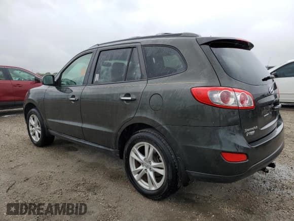 ✅ 2012 Hyundai Santa Fe Limited • VIN: 5XYZK4AG1CG115502 • Lot: 75128574. Listed on Copart with 101,155 mi. Free auction sales archive from the USA and detailed vehicle history report at DreamBid. Image 2.