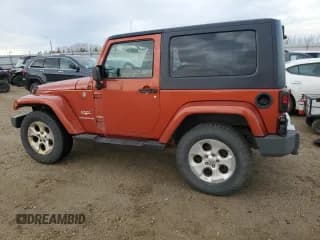✅ 2009 Jeep Wrangler Sahara • VIN: 1J4FA54189L723415 • Лот: 91922975. Опубликован ранее на Copart с пробегом 229 520 миль. Бесплатный доступ к архиву аукционных продаж из США и подробный отчёт об истории автомобиля на DreamBid. Изображение 2.