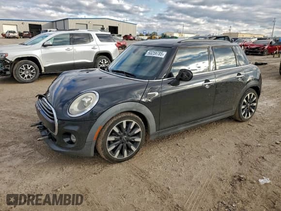 ✅ 2016 MINI Hardtop 4 Door • VIN: WMWXU1C52G2D57646 • Lot: 93259785. Listed on Copart with 64,109 mi. Free auction sales archive from the USA and detailed vehicle history report at DreamBid. Image 1.
