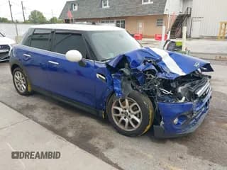 ✅ 2019 MINI Hardtop 4 Door Cooper • VIN: WMWXU1C54K2H74095 • Лот: 43030269. Опубликован ранее на IAAI с пробегом 50 663 миль. Бесплатный доступ к архиву аукционных продаж из США и подробный отчёт об истории автомобиля на DreamBid. Изображение 1.