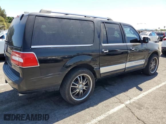✅ 2011 Lincoln Navigator • VIN: 5LMJJ3H56BEJ08799 • Lot: 66573895. Listed on Copart with 90,067 mi. Free auction sales archive from the USA and detailed vehicle history report at DreamBid. Image 3.