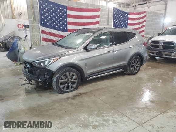 ✅ 2018 Hyundai Santa Fe Ultimate • VIN: 5XYZWDLA9JG531257 • Лот: 44883014. Опубликован ранее на Copart с пробегом 103 412 миль. Бесплатный доступ к архиву аукционных продаж из США и подробный отчёт об истории автомобиля на DreamBid. Изображение 1.