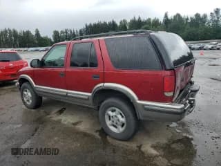 ✅ 1999 Chevrolet Blazer LT • VIN: 1GNDT13W7X2243230 • Lot: 57298805. Wystawiony na Copart z przebiegiem 230 907 mil. Bezpłatny archiwum sprzedaży aukcyjnych z USA i szczegółowy raport historii pojazdu na DreamBid. Zdjęcie 2.