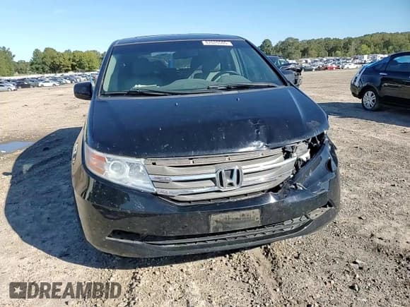 ✅ 2012 Honda Odyssey EX-L • VIN: 5FNRL5H68CB015002 • Lot: 87026505. Wystawiony na Copart z przebiegiem 219 266 mil. Bezpłatny archiwum sprzedaży aukcyjnych z USA i szczegółowy raport historii pojazdu na DreamBid. Zdjęcie 13.
