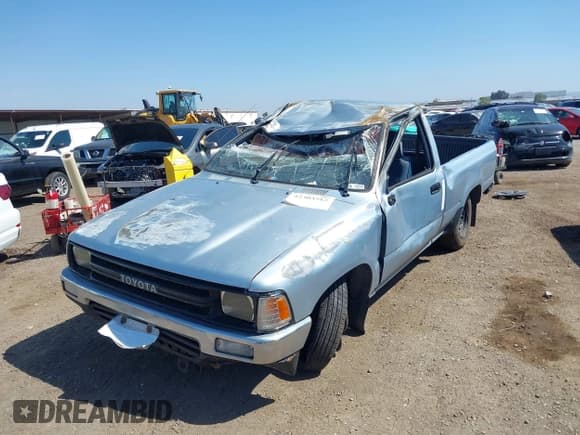 ✅ 1990 Toyota Pickup • VIN: JT4RN81A3L5058528 • Lot: 42303582. Listed on IAAI with 311,679 mi. Free auction sales archive from the USA and detailed vehicle history report at DreamBid. Image 2.