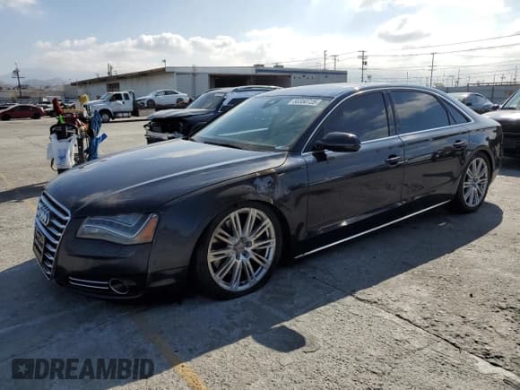 ✅ 2012 Audi A8 • VIN: WAURVAFDXCN036159 • Лот: 80350725. Опубликован ранее на Copart с пробегом 180 639 миль. Бесплатный доступ к архиву аукционных продаж из США и подробный отчёт об истории автомобиля на DreamBid. Изображение 1.