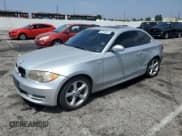 ✅ 2009 BMW 1 Series 128i • VIN: WBAUP93559VF48214 • Лот: 65910845. Опубликован ранее на Copart с пробегом 181 945 миль. Бесплатный доступ к архиву аукционных продаж из США и подробный отчёт об истории автомобиля на DreamBid. Изображение 1.