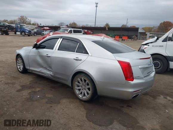 ✅ 2014 Cadillac CTS Luxury AWD • VIN: 1G6AX5S38E0147228 • Lot: 43601729. Listed on IAAI with 116,728 mi. Free auction sales archive from the USA and detailed vehicle history report at DreamBid. Image 3.