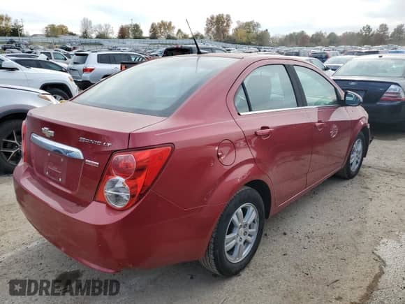2012 Chevrolet Sonic LT z VIN 1G1JC5SB9C4171004, wystawiony jako Copart lot #73356883 z przebiegiem 155 863 mil mil oraz Szkoda całkowita • Salvage title. Historia ofert i sprzedaży dostępna na DreamBid. Obrazek 3.