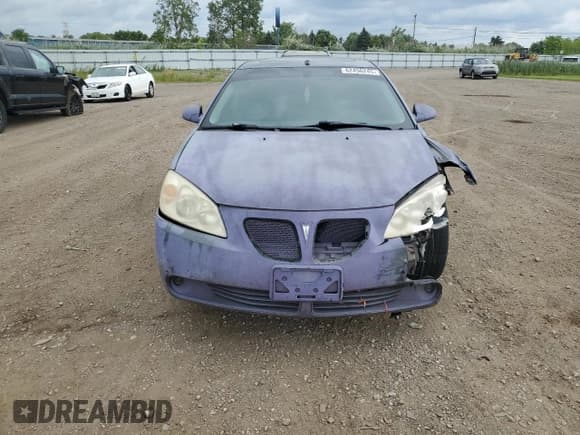✅ 2009 Pontiac G6 1SA • VIN: 1G2ZG57N894143600 • Lot: 62456245. Wystawiony na Copart z przebiegiem 105 649 mil. Bezpłatny archiwum sprzedaży aukcyjnych z USA i szczegółowy raport historii pojazdu na DreamBid. Zdjęcie 5.