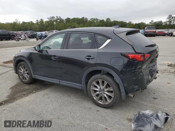 ✅ 2019 Mazda CX-5 Grand Touring • VIN: JM3KFBDM9K0549030 • Лот: 82774585. Опубликован ранее на Copart с пробегом 74 307 миль. Бесплатный доступ к архиву аукционных продаж из США и подробный отчёт об истории автомобиля на DreamBid. Изображение 2.
