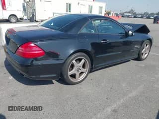 ✅ 2003 Mercedes-Benz SL 500 • VIN: WDBSK75F23F058491 • Lot: 43538299. Wystawiony na IAAI z przebiegiem 92 617 mil. Bezpłatny archiwum sprzedaży aukcyjnych z USA i szczegółowy raport historii pojazdu na DreamBid. Zdjęcie 4.