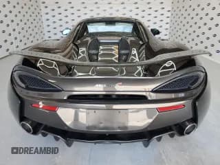 ✅ 2018 McLaren 570S • VIN: SBM13FAA4JW005603 • Lot: 68124015. Listed on Copart with 10,892 mi. Free auction sales archive from the USA and detailed vehicle history report at DreamBid. Image 6.