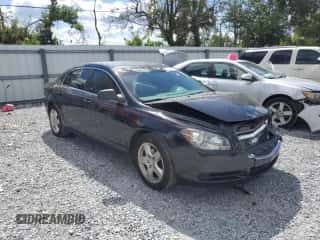 2012 Chevrolet Malibu 1LS z VIN 1G1ZB5E0XCF156340, wystawiony jako Copart lot #86523055 z przebiegiem 121 189 mil mil oraz Szkoda całkowita • Salvage title. Historia ofert i sprzedaży dostępna na DreamBid. Obrazek 4.