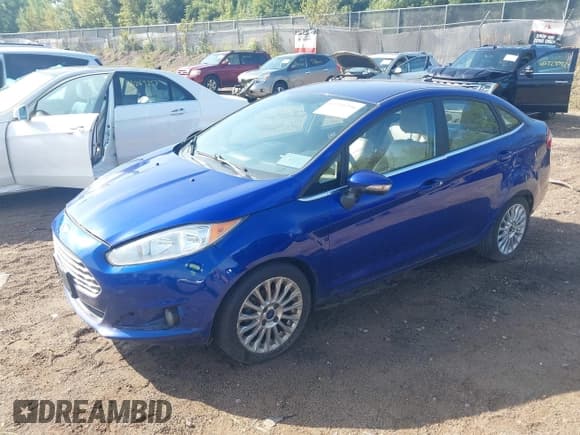 ✅ 2014 Ford Fiesta Titanium • VIN: 3FADP4CJ1EM151447 • Lot: 43244236. Wystawiony na IAAI z przebiegiem 129 091 mil. Bezpłatny archiwum sprzedaży aukcyjnych z USA i szczegółowy raport historii pojazdu na DreamBid. Zdjęcie 2.