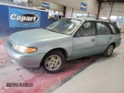 ✅ 1997 Ford Escort LX • VIN: 3FALP15P9VR107467 • Lot: 76061074. Listed on Copart with 69,873 mi. Free auction sales archive from the USA and detailed vehicle history report at DreamBid. Image 1.