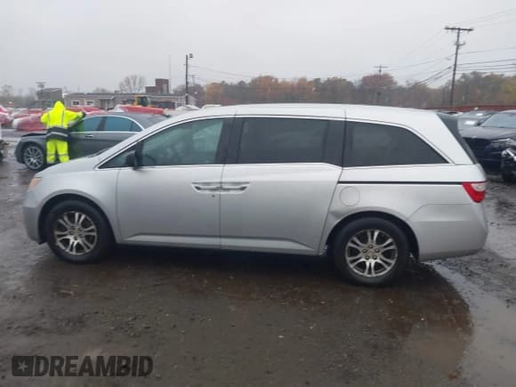 ✅ 2011 Honda Odyssey EX-L • VIN: 5FNRL5H65BB026134 • Lot: 43580374. Listed on IAAI with 149,429 mi. Free auction sales archive from the USA and detailed vehicle history report at DreamBid. Image 14.
