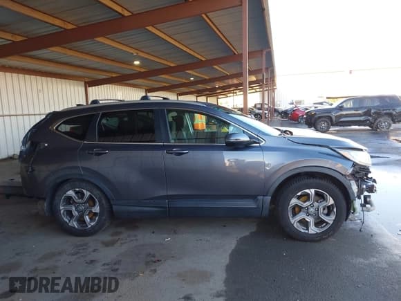 ✅ 2018 Honda CR-V EX • VIN: 2HKRW2H54JH649435 • Lot: 43726533. Listed on IAAI with 42,558 mi. Free auction sales archive from the USA and detailed vehicle history report at DreamBid. Image 14.