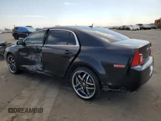 ✅ 2011 Chevrolet Malibu 1LS • VIN: 1G1ZB5E18BF311443 • Lot: 74610014. Listed on Copart with 188,923 mi. Free auction sales archive from the USA and detailed vehicle history report at DreamBid. Image 2.