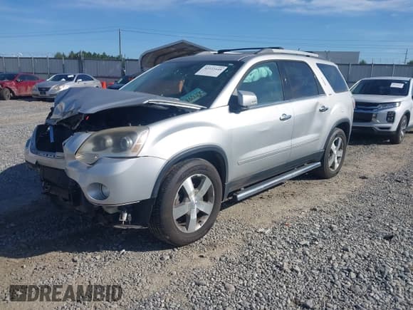 ✅ 2010 GMC Acadia SLT1 • VIN: 1GKLRMED9AJ256031 • Lot: 42333448. Listed on IAAI with 173,438 mi. Free auction sales archive from the USA and detailed vehicle history report at DreamBid. Image 17.