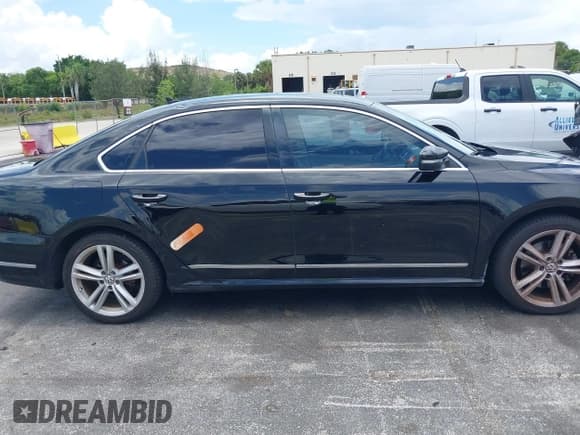 ✅ 2015 Volkswagen Passat SEL Premium • VIN: 1VWCS7A37FC024731 • Lot: 42557231. Listed on IAAI with 94,724 mi. Free auction sales archive from the USA and detailed vehicle history report at DreamBid. Image 13.