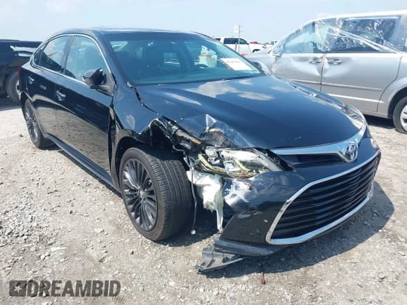 ✅ 2016 Toyota Avalon Limited • VIN: 4T1BK1EB7GU206739 • Lot: 42267483. Listed on IAAI with 131,930 mi. Free auction sales archive from the USA and detailed vehicle history report at DreamBid. Image 1.