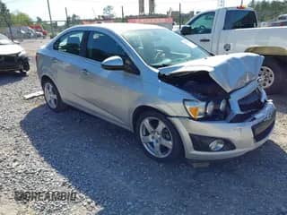 2016 Chevrolet Sonic LTZ with VIN 1G1JE5SB0G4137727, listed as a IAAI auction lot 41911950 with 96,752 mi miles and . Bid and sale history available at DreamBid. Image 1.