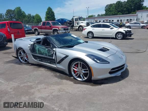 2014 Chevrolet Corvette Z51 3LT z VIN 1G1YM3D7XE5120603, wystawiony jako IAAI lot #42313984 z przebiegiem 64 199 mil mil oraz . Historia ofert i sprzedaży dostępna na DreamBid. Obrazek 1.
