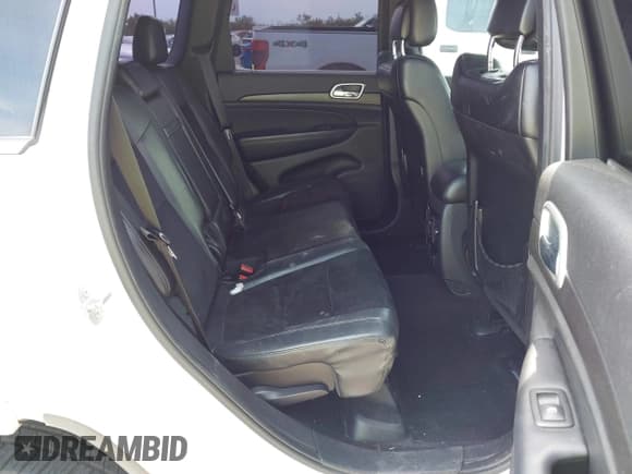 ✅ 2015 Jeep Grand Cherokee Laredo • VIN: 1C4RJEAG7FC104893 • Lot: 43009030. Listed on IAAI with 128,500 mi. Free auction sales archive from the USA and detailed vehicle history report at DreamBid. Image 8.