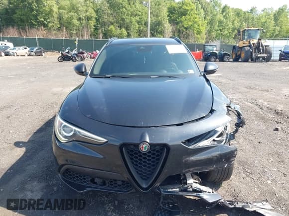 ✅ 2018 Alfa Romeo Stelvio Ti Sport • VIN: ZASFAKNN7J7B87597 • Lot: 42600727. Wystawiony na IAAI z przebiegiem 73 100 mil. Bezpłatny archiwum sprzedaży aukcyjnych z USA i szczegółowy raport historii pojazdu na DreamBid. Zdjęcie 12.