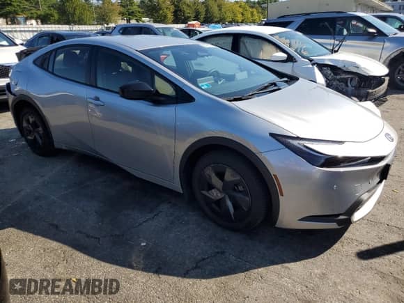 2023 Toyota Prius XSE Premium с VIN JTDACACU3P3007131, выставлен на аукционе Copart как лот 80720165 с пробегом Не указан миль и Списание • Salvage title. История ставок и продаж доступна на DreamBid. Изображение 4.