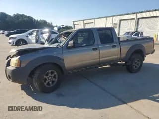 ✅ 2003 Nissan Frontier XE • VIN: 1N6ED29X03C411016 • Lot: 84659135. Listed on Copart with 173,014 mi. Free auction sales archive from the USA and detailed vehicle history report at DreamBid. Image 1.