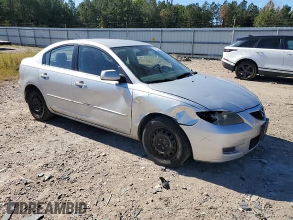 ✅ 2007 Mazda 3 i Touring • VIN: JM1BK32FX71764187 • Лот: 86643935. Опубликован ранее на Copart с пробегом 249 651 миль. Бесплатный доступ к архиву аукционных продаж из США и подробный отчёт об истории автомобиля на DreamBid. Изображение 4.
