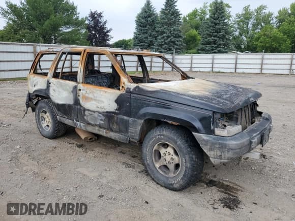 ✅ 1997 Jeep Grand Cherokee Laredo • VIN: 1J4GZ58S4VC755398 • Lot: 61919465. Listed on Copart with Not provided. Free auction sales archive from the USA and detailed vehicle history report at DreamBid. Image 4.
