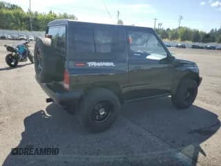 ✅ 1998 Chevrolet Tracker • VIN: 2CNBJ1868W6925819 • Лот: 70881874. Опубликован ранее на Copart с пробегом 180 849 миль. Бесплатный доступ к архиву аукционных продаж из США и подробный отчёт об истории автомобиля на DreamBid. Изображение 3.