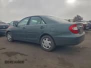 ✅ 2002 Toyota Camry XLE • VIN: JTDBE30K420099583 • Lot: 94325855. Listed on Copart with 202,517 mi. Free auction sales archive from the USA and detailed vehicle history report at DreamBid. Image 2.