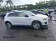 2014 Mitsubishi Outlander SE z VIN 4A4AP4AU6EE003514, wystawiony jako IAAI lot #43403657 z przebiegiem 183 838 mil mil oraz . Historia ofert i sprzedaży dostępna na DreamBid. Obrazek 13.