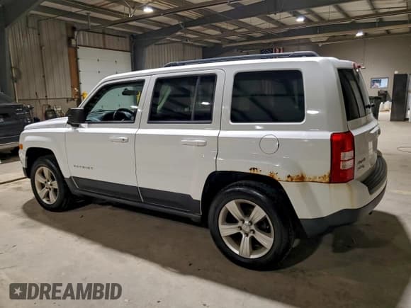 ✅ 2014 Jeep Patriot Latitude • VIN: 1C4NJRFB1ED627886 • Lot: 94537585. Listed on Copart with 118,800 mi. Free auction sales archive from the USA and detailed vehicle history report at DreamBid. Image 2.