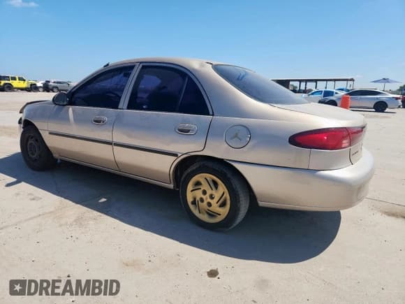 ✅ 1999 Ford Escort LX • VIN: 1FAFP10PXXW244941 • Lot: 66805705. Listed on Copart with 1,344,002 mi. Free auction sales archive from the USA and detailed vehicle history report at DreamBid. Image 2.