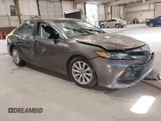 2020 Toyota Camry LE with VIN 4T1C11AK5LU990636, listed as a IAAI auction lot 43149281 with 118,691 mi miles and . Bid and sale history available at DreamBid. Image 1.