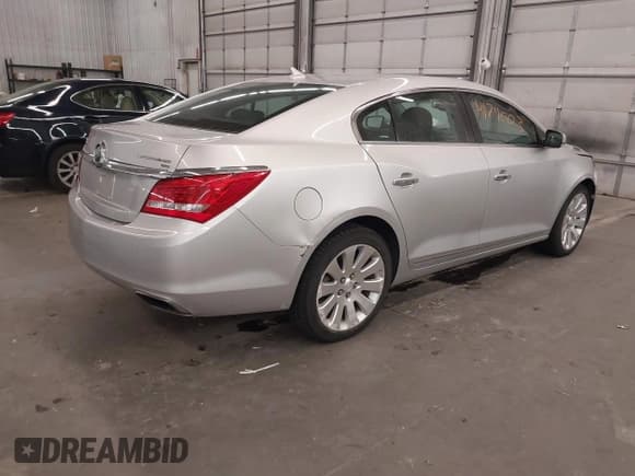 ✅ 2014 Buick LaCrosse Premium I • VIN: 1G4GE5G34EF304980 • Лот: 42174003. Опубликован ранее на IAAI с пробегом 87 111 миль. Бесплатный доступ к архиву аукционных продаж из США и подробный отчёт об истории автомобиля на DreamBid. Изображение 4.