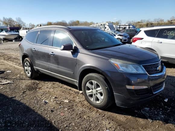 2015 Chevrolet Traverse LS with VIN 1GNKVFKD7FJ109210, listed as a Copart auction lot 90073995 with 182,239 mi miles and Clean title. Bid and sale history available at DreamBid. Image 4.