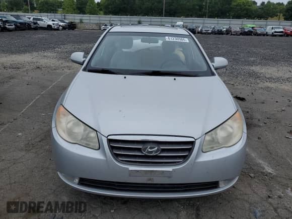 2007 Hyundai Elantra GLS with VIN KMHDU46DX7U084981, listed as a Copart auction lot 61230984 with 93,887 mi miles and Salvage title. Bid and sale history available at DreamBid. Image 5.