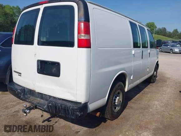 ✅ 2014 Chevrolet Express Cargo • VIN: 1GCWGFCG0E1100859 • Lot: 42142748. Listed on IAAI with 182,900 mi. Free auction sales archive from the USA and detailed vehicle history report at DreamBid. Image 4.